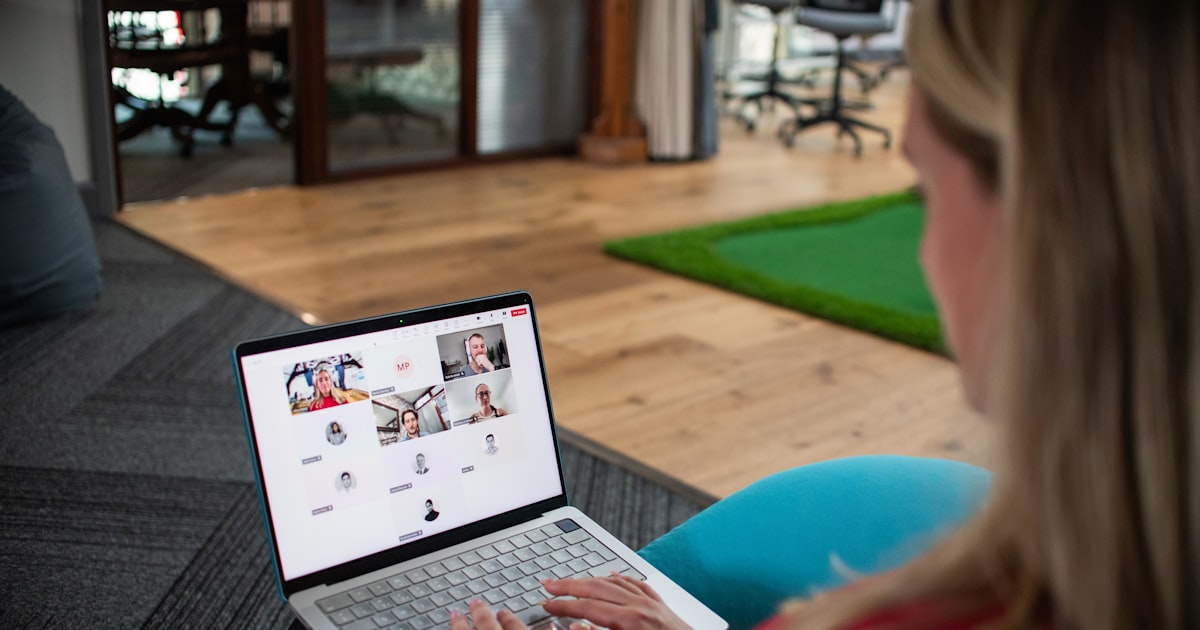 Woman on laptop in video conference call